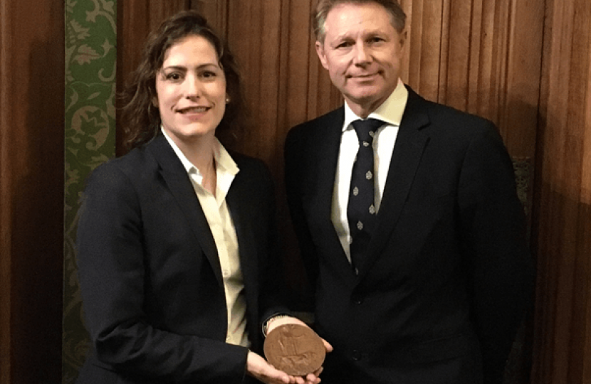 Victoria Atkins MP with David Morris MP holding Charles Woodward's plaque