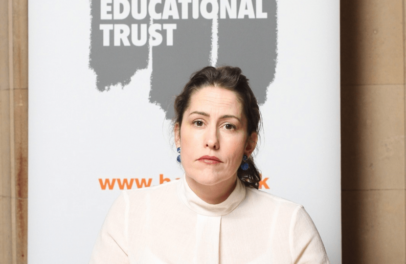 Victoria Atkins MP signs the Book of Commitment