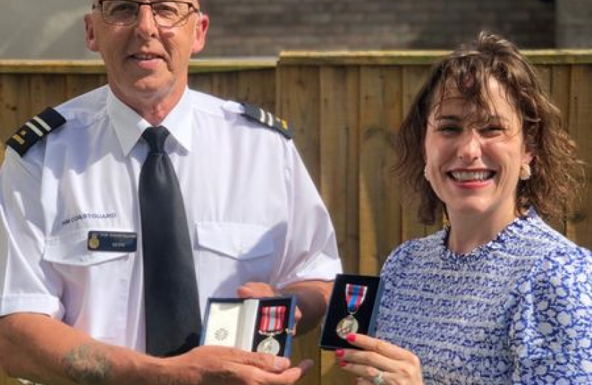 Victoria with Mablethorpe Station Officer Kevin Corner, awarded his long service medal for 20 years.