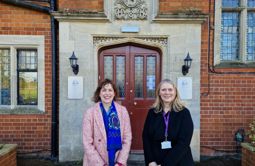 Victoria Atkins with Valerie Waby, the Chief Executive outside Linkage College's Toynton Campus