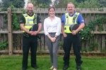 Victoria with police officers