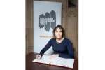 Victoria Atkins signing the Holocaust Book of Commitment