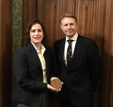 Victoria Atkins MP with David Morris MP holding Charles Woodward's plaque