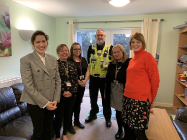 Victoria Atkins MP speaks to staff at a constituency-based domestic abuse refuge