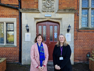 Victoria Atkins with Valerie Waby, the Chief Executive outside Linkage College's Toynton Campus